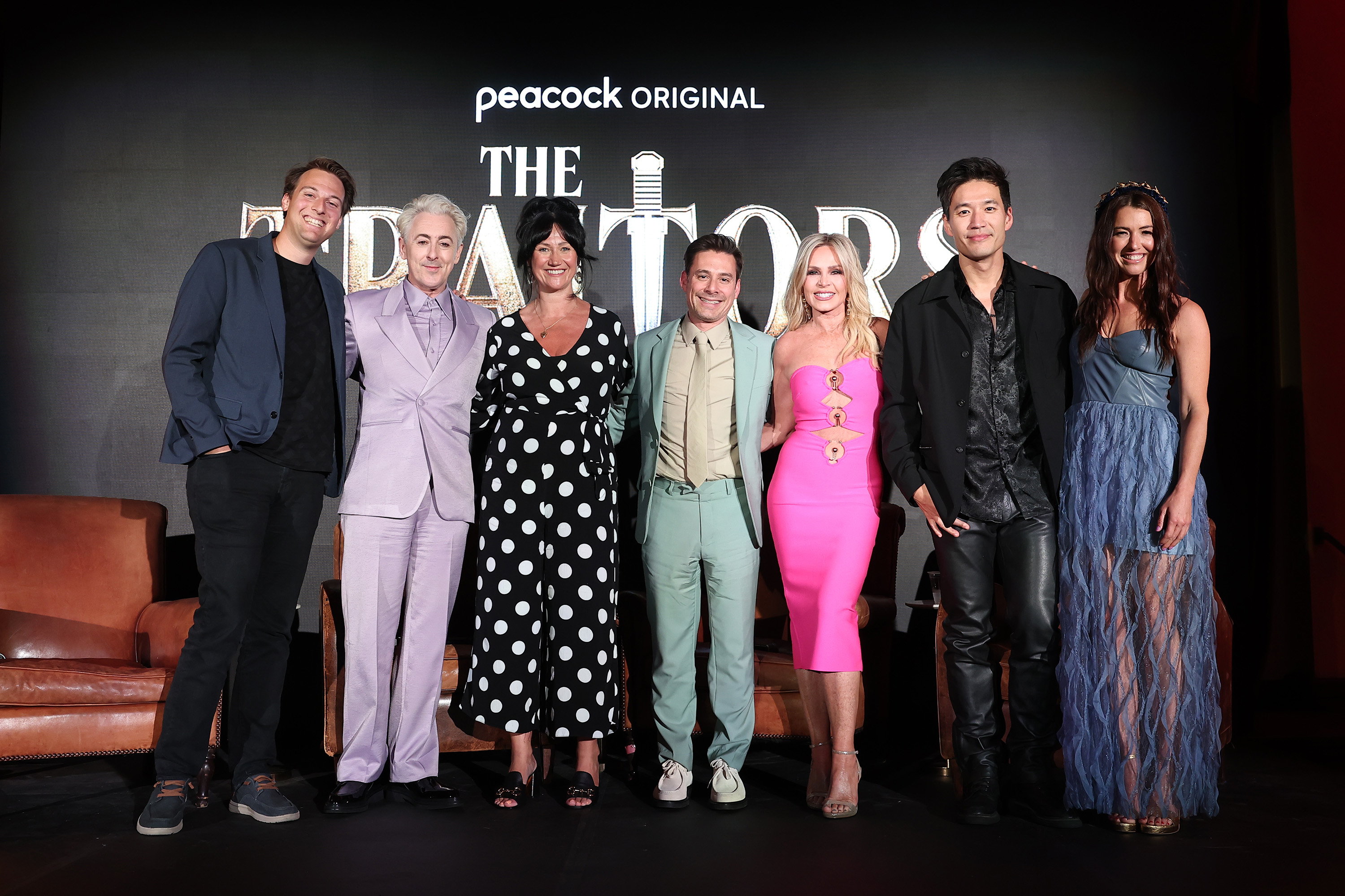 Group photo at a Peacock Original 'The Traitors' event