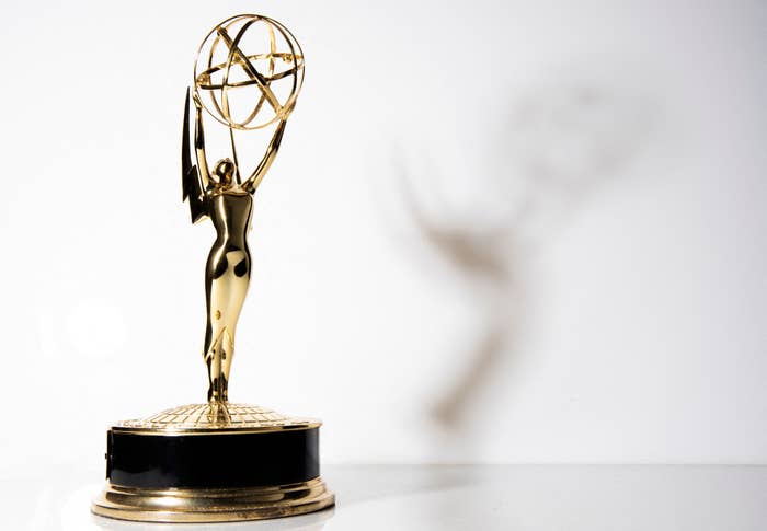 Emmy Award trophy with a winged woman holding an atom, representing excellence in television industry achievements