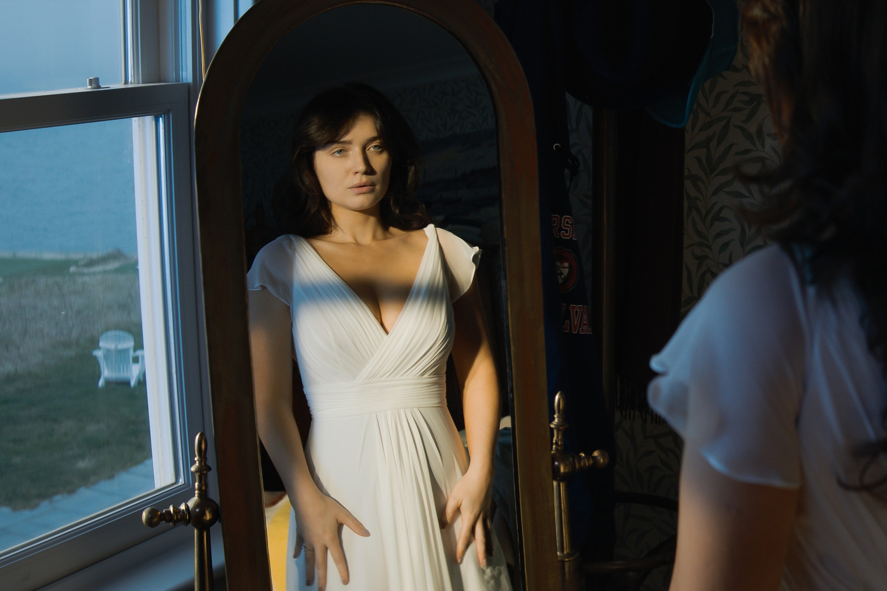 Eve Hewson in a white dress in "The Perfect Couple"