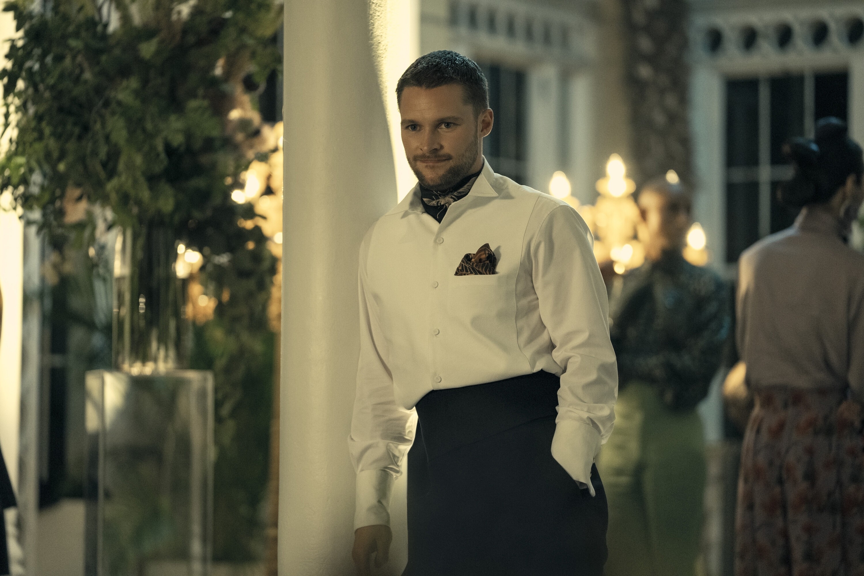 Jack Reynor in a button-up shirt and slacks in "The Peripheral"