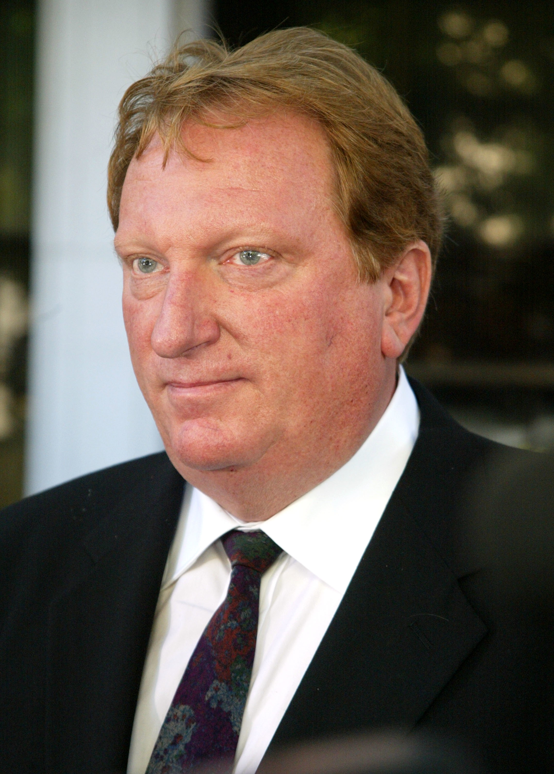 Jeffrey Jones in a suit and tie outside the Los Angeles Superior Court
