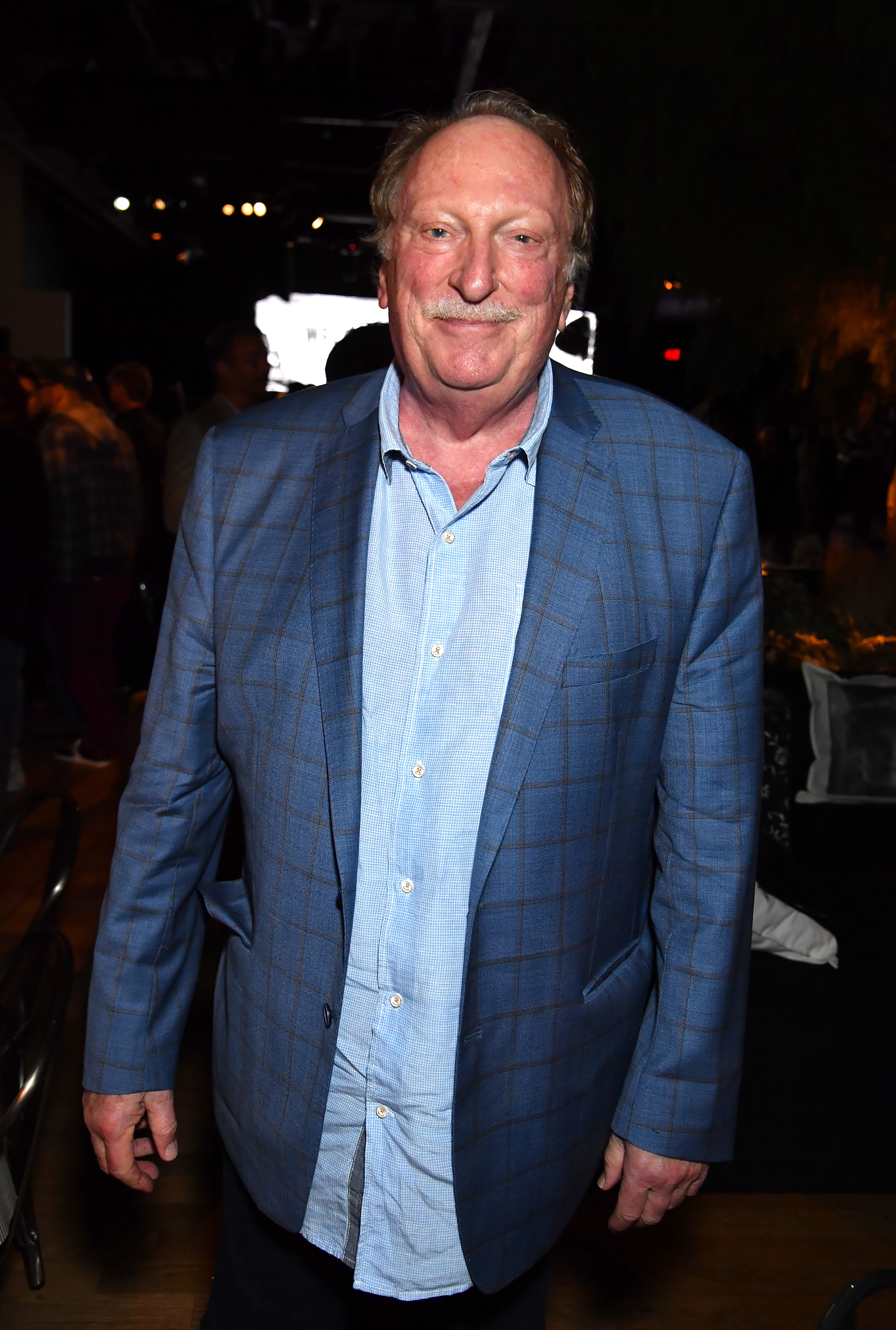 Jeffrey Jones in a checkered suit at the premiere of "Deadwood: The Movie"