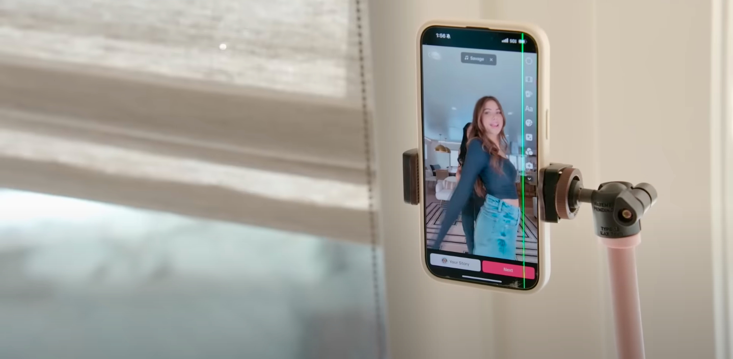 Mormon wives TikTok dance in their home on a mounted smartphone. The dance is being recorded near a window