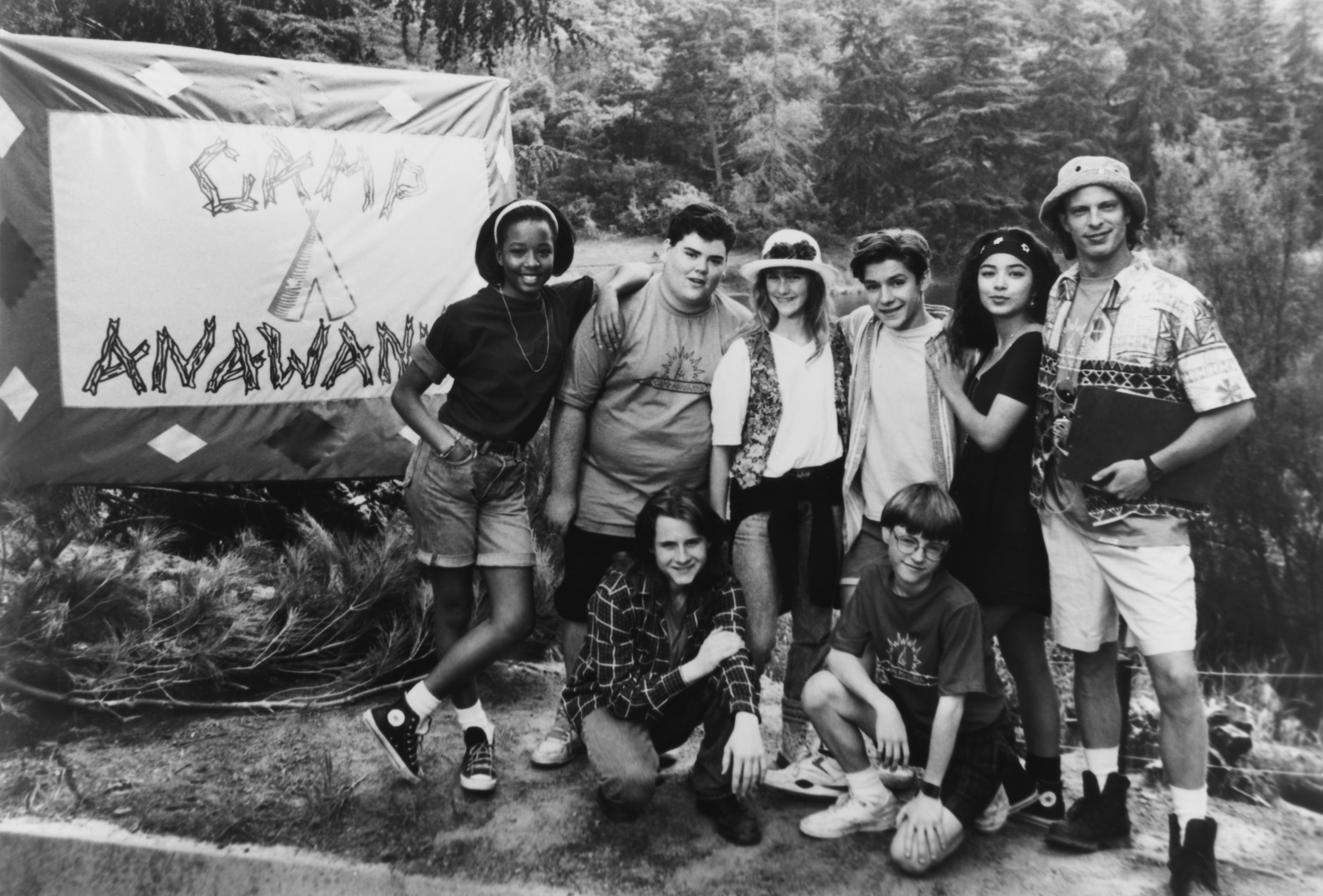 Cast of "Salute Your Shorts" pose by a "Camp Anawanna" sign