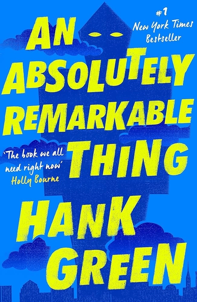 Book cover for "An Absolutely Remarkable Thing" by Hank Green, featuring a quote from Holly Bourne and the note "#1 New York Times Bestseller."
