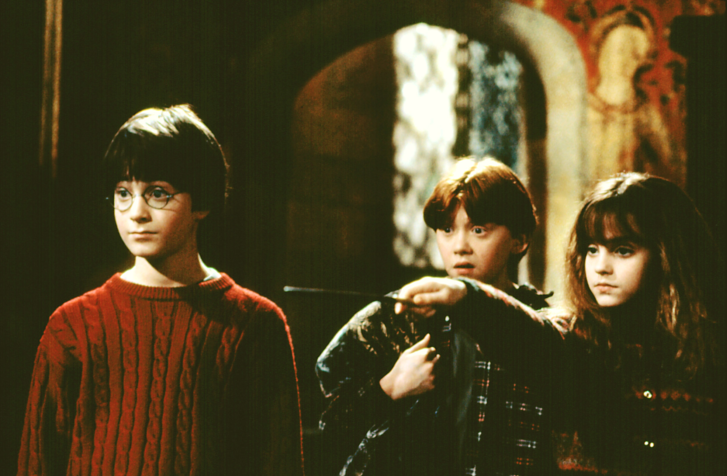 Daniel Radcliffe, Rupert Grint, and Emma Watson in "Harry Potter and the Sorcerer's Stone"