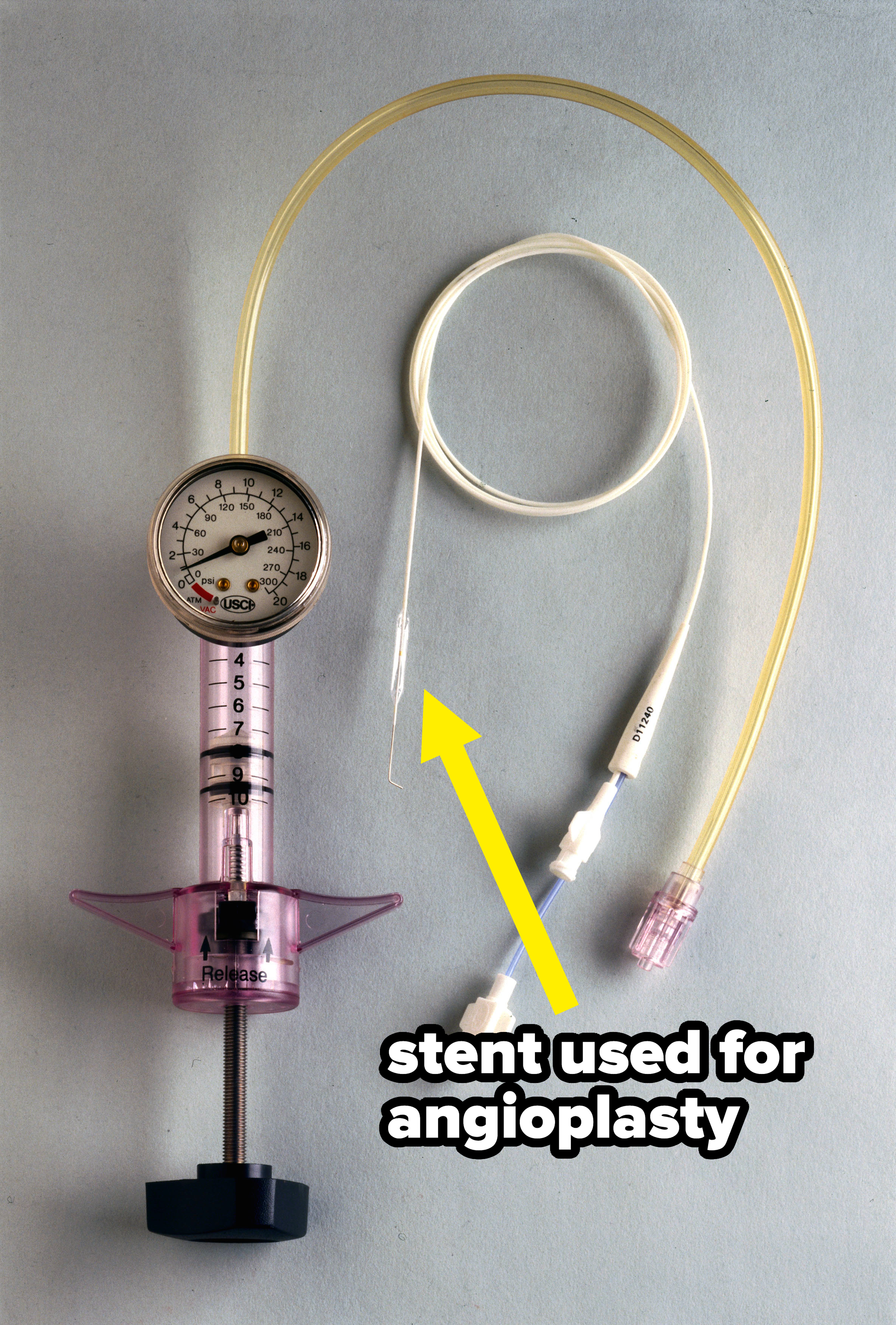 Medical syringe with gauge, tubing, and various attachments
