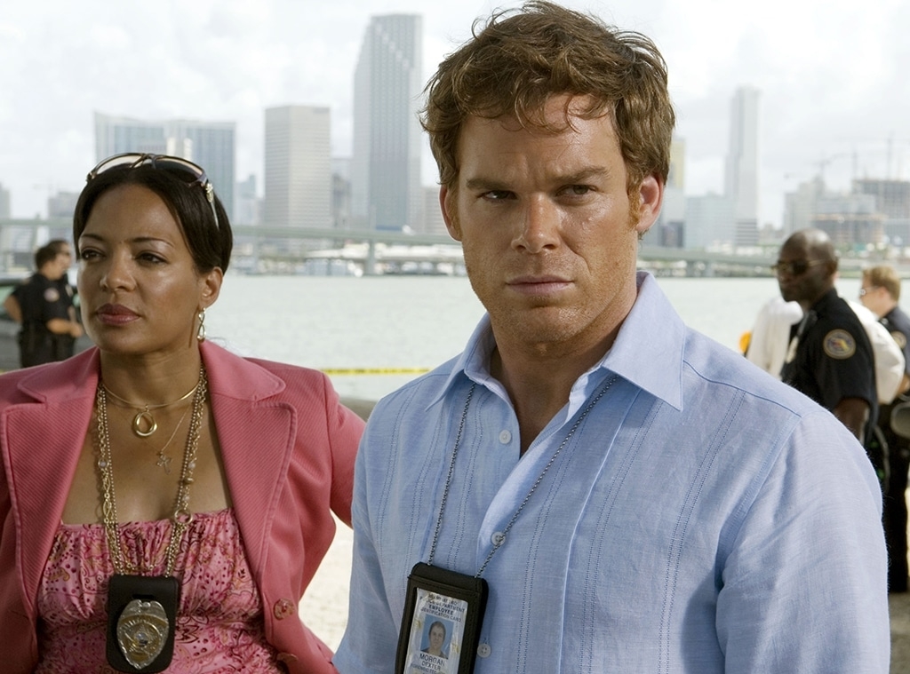 Lauren Vélez and Michael C. Hall in a scene from "Dexter," with Miami skyline in the background