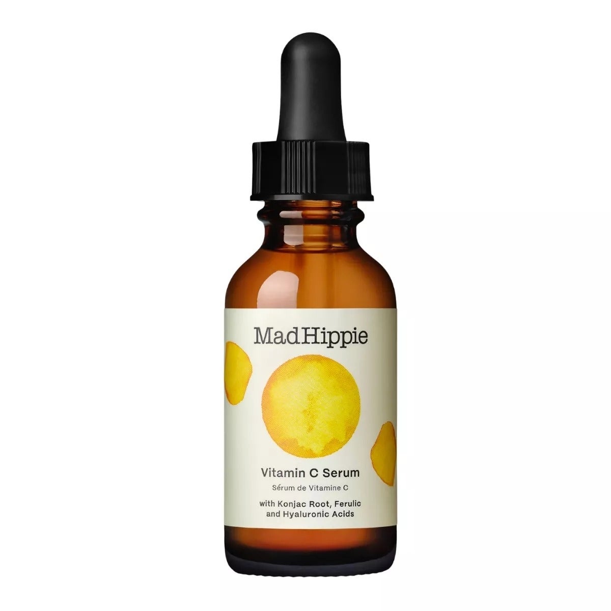 Mad Hippie Vitamin C Serum vessel  with a statement   featuring orange-yellow citrus illustrations and substance   mentioning Konjac Root, Ferulic, and Hyaluronic Acids