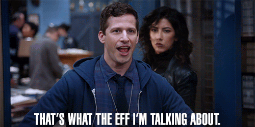 Andy Samberg, wearing a police badge and blue shirt, exclaims, "That's what the eff I'm talking about!" while Stephanie Beatriz looks on in surprise. #Brooklyn99