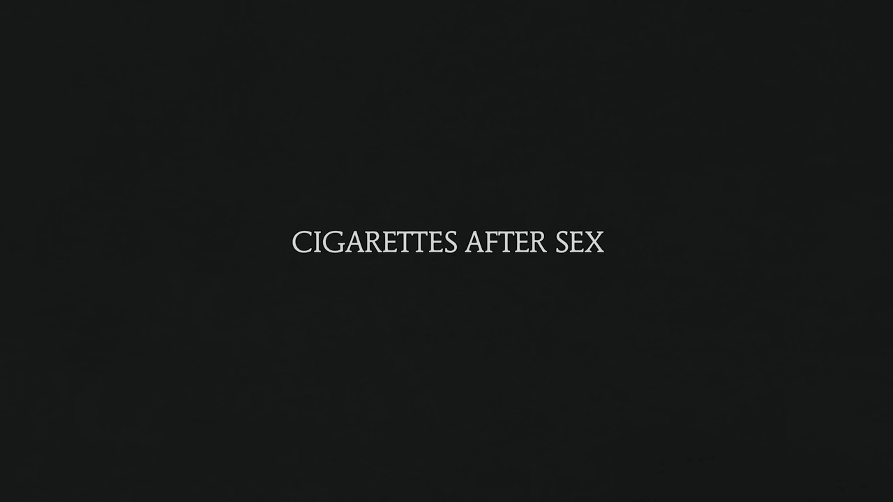 Cigarettes After Sex text on a dark background
