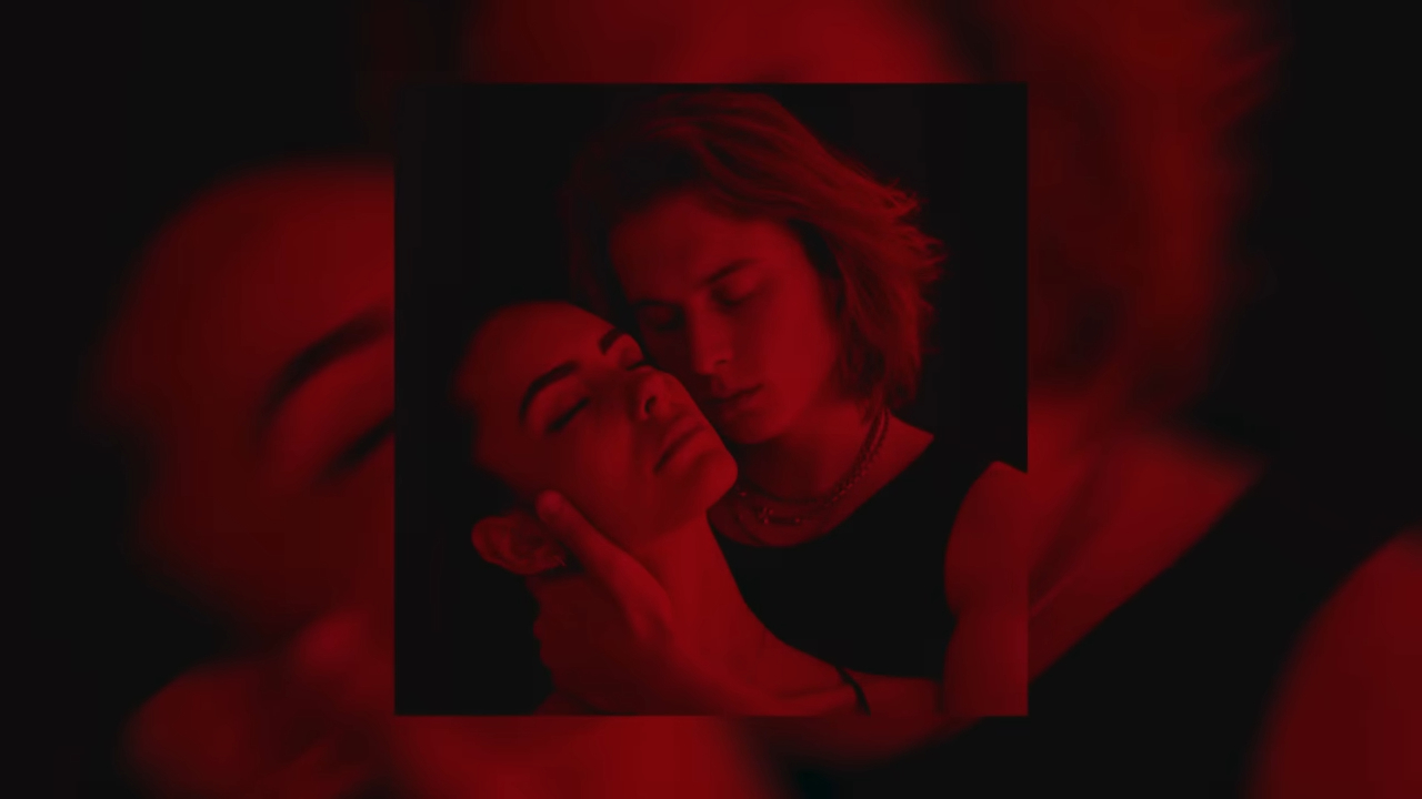 Two people hold each other