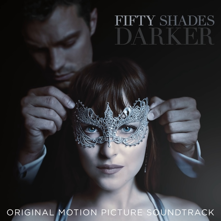 Cover of the "Fifty Shades Darker" soundtrack features a masked Dakota Johnson with Jamie Dornan adjusting her mask