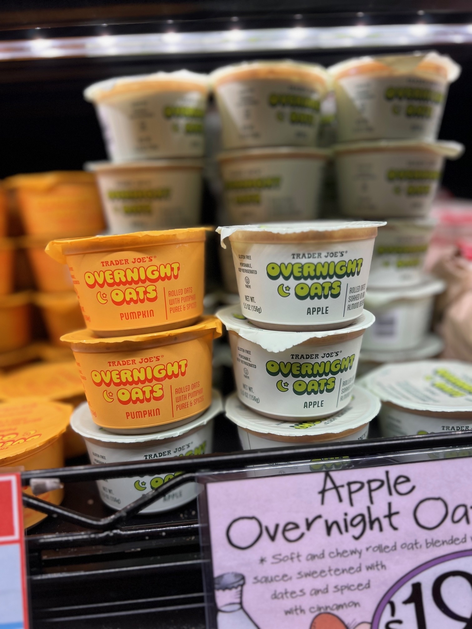 Trader Joe's Overnight Oats in two flavors: Pumpkin and Apple, displayed on store shelves