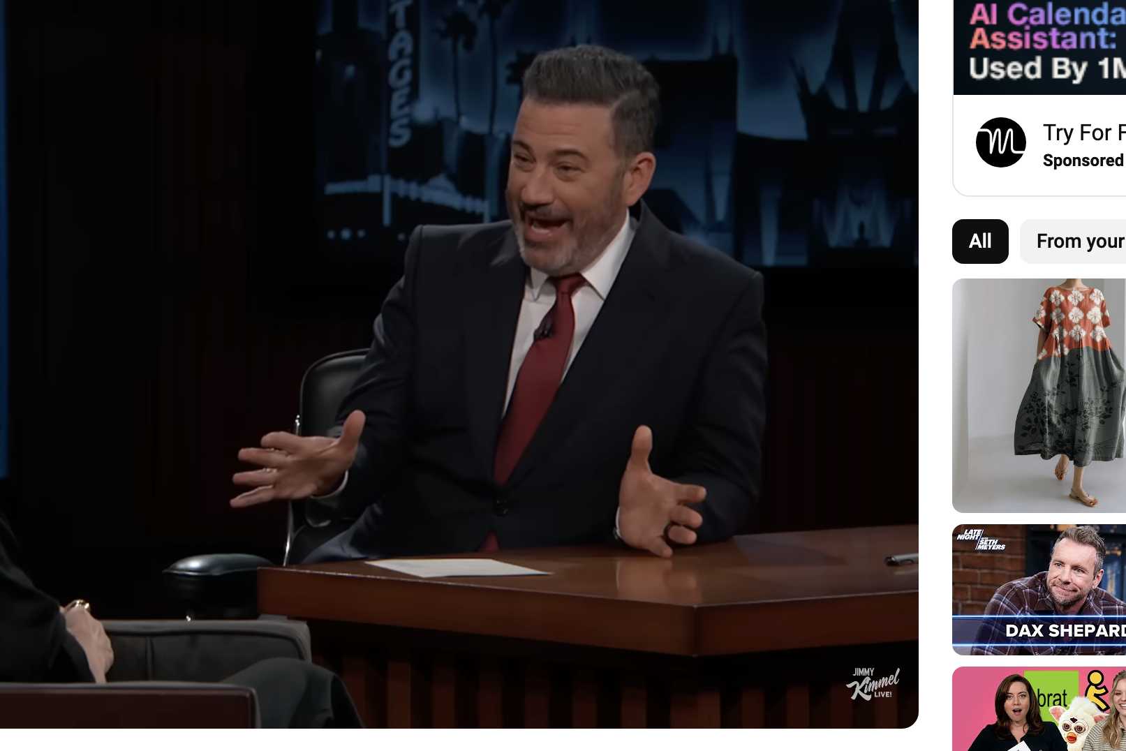 Kristen Bell and Jimmy Kimmel on &quot;Jimmy Kimmel Live&quot; talk show. Kristen is seated talking to Jimmy, who gestures animatedly. Text includes video title and YouTube details