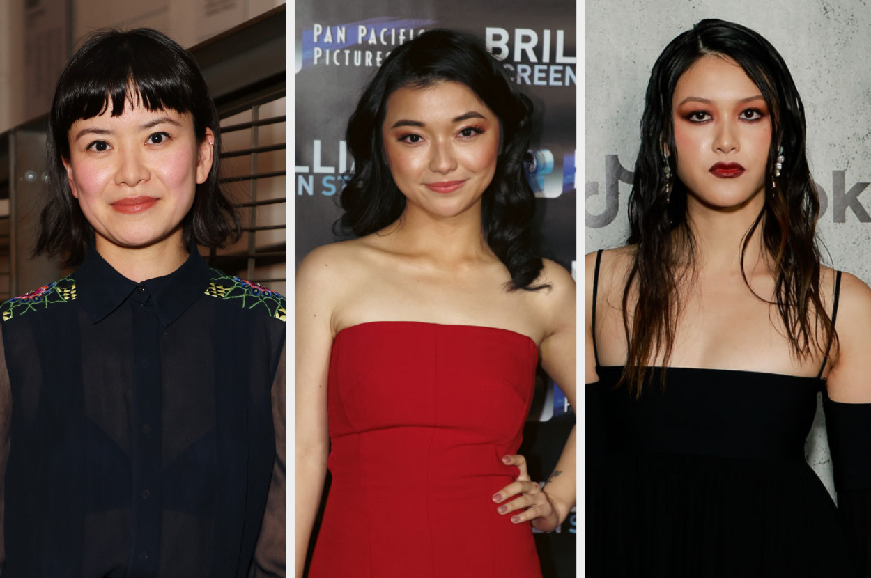 Three women appear together: one with short hair, a patterned top, one in a red strapless dress, and one in a black off-shoulder dress with bold makeup