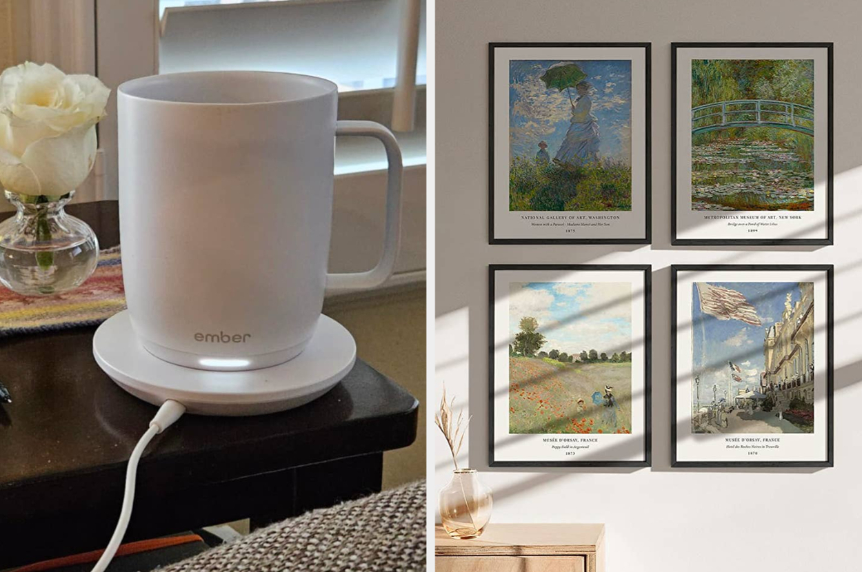 A white Ember mug sits on a charging coaster. On the wall nearby are four framed art prints, featuring nature and city scenes