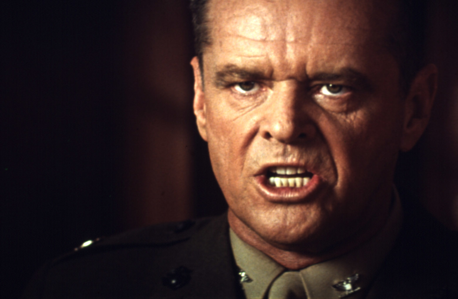 Jack Nicholson, wearing a military uniform, delivering an intense expression in a scene, likely from a movie