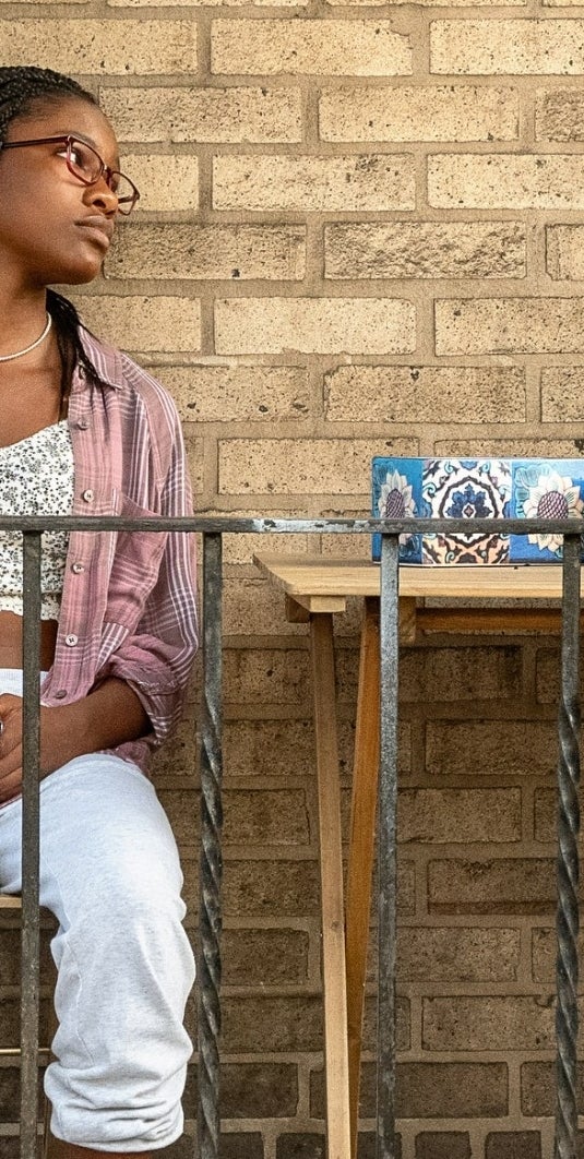 Anthony B. Jenkins standing in a doorway in "The Deliverance"