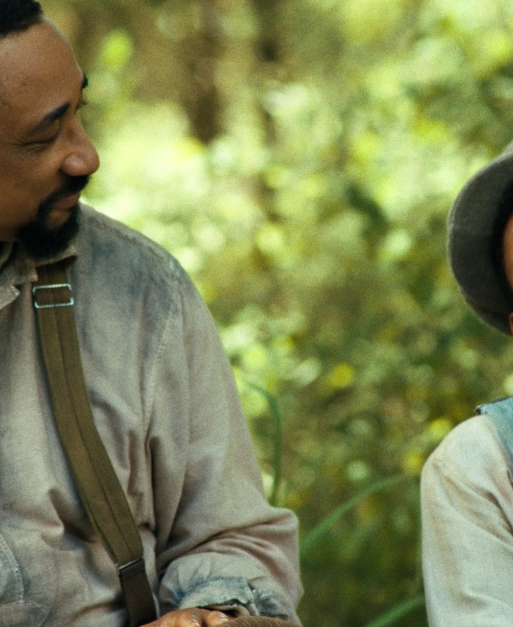 Percy Daggs IV wearing overalls and a cap in "The Last Days of Ptolemy Grey"