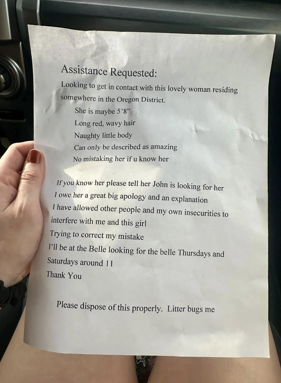 A handwritten note seeking to contact a woman described as 5'8", with long red wavy hair, who may be in the Oregon District. The writer apologizes and asks for John's help