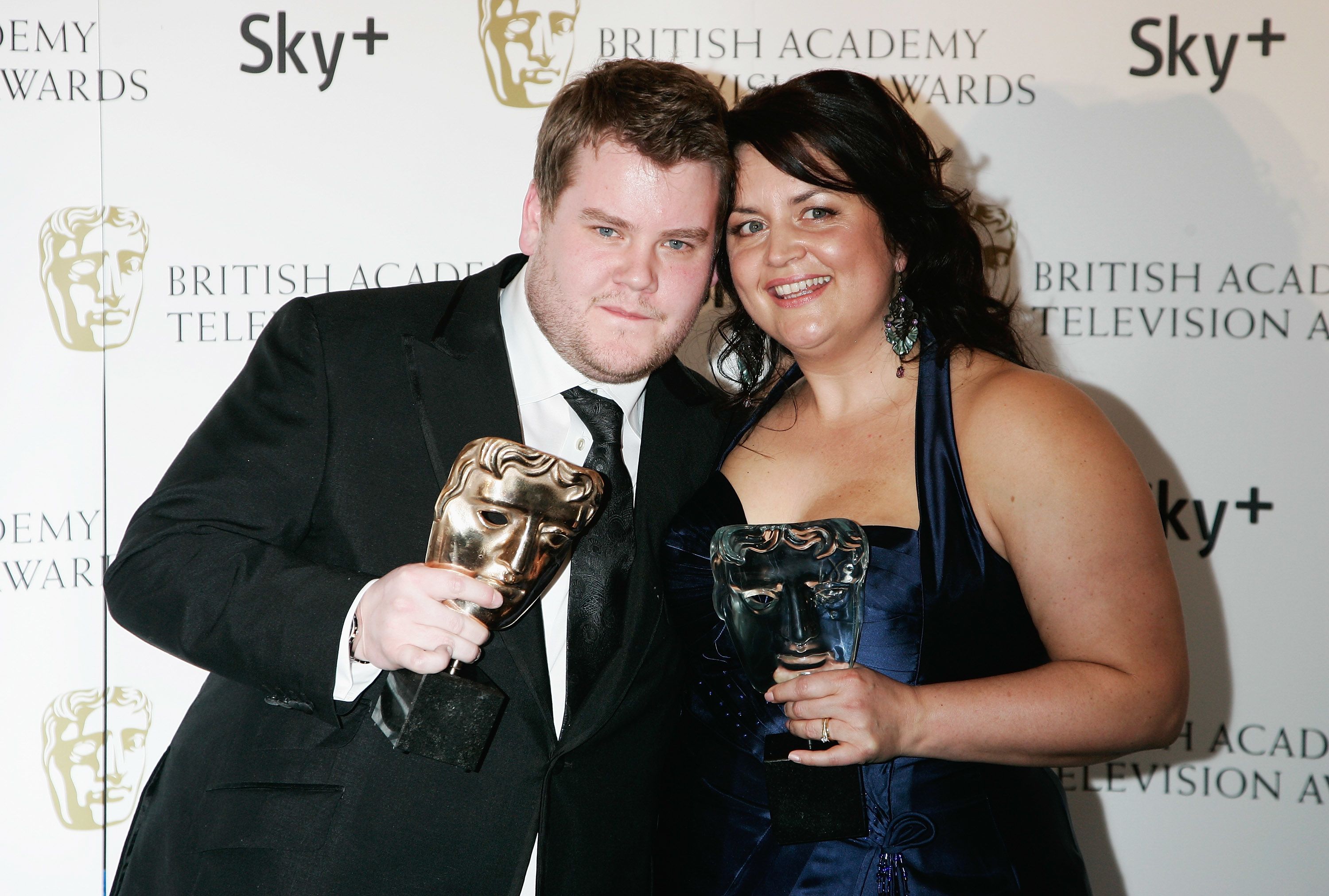 James Corden and Ruth Jones posing together with their BAFTA awards at the British Academy Television Awards event