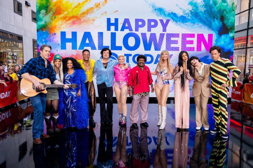 Blake Shelton, Hoda Kotb, Al Roker, Carson Daly, Savannah Guthrie, Craig Melvin, Sheinelle Jones, Jenna Bush Hager, Dylan Dreyer, Willie Geist, and Peter Alexander in Halloween costumes on "Today" show set