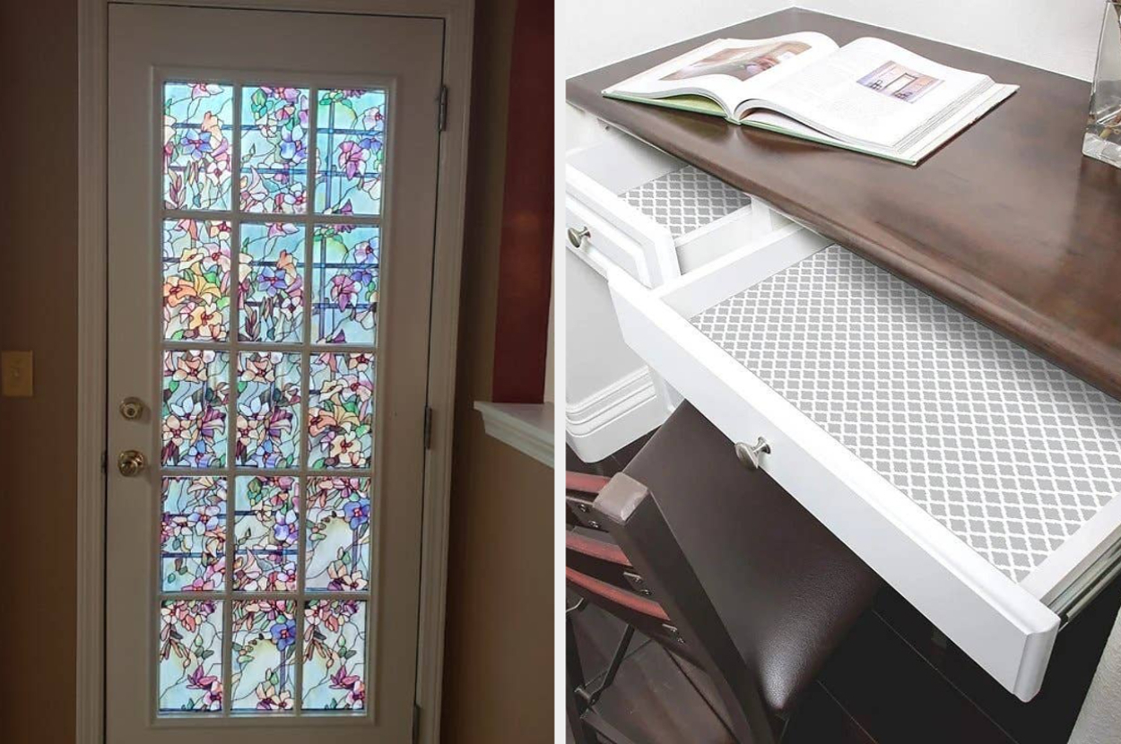 A glass door with intricate stained glass panels and a desk with an open drawer holding a book