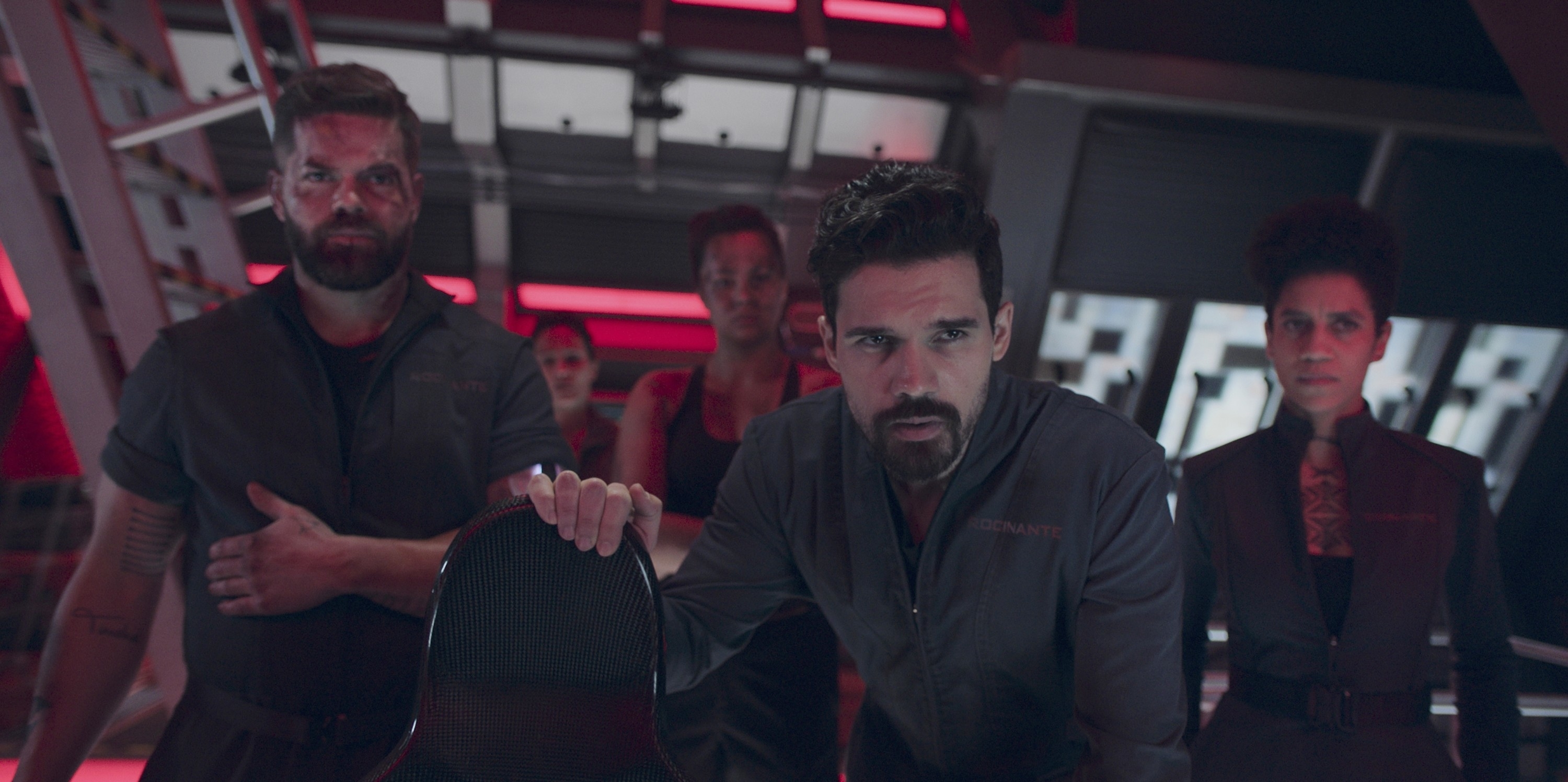 From left to right: Amos Burton (Wes Chatham), Naomi Nagata (Dominique Tipper), James Holden (Steven Strait) in a tense scene from &quot;The Expanse.&quot;