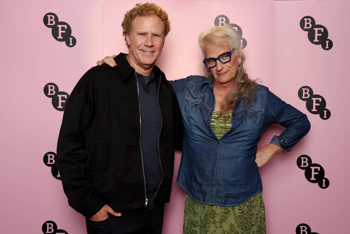 Will Ferrell and Harper Steele pose together in front of a BFI backdrop. Will is in casual attire, while Harper wears glasses and a denim shirt over a dress