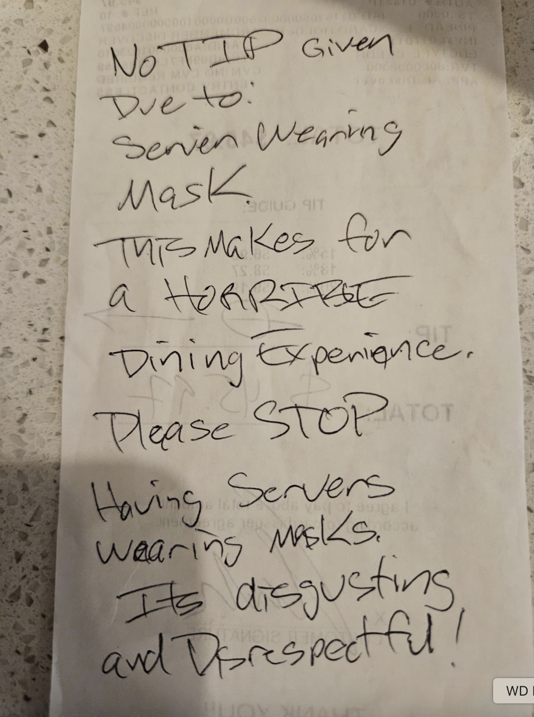 A handwritten note on a receipt reads: "No TIP given due to: Server wearing mask; This makes for a HORRIBLE dining experience; Please STOP having servers wearing masks; It's disgusting and disrespectful!"