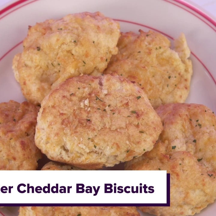 Close-up of a plate with several Red Lobster Cheddar Bay Biscuits