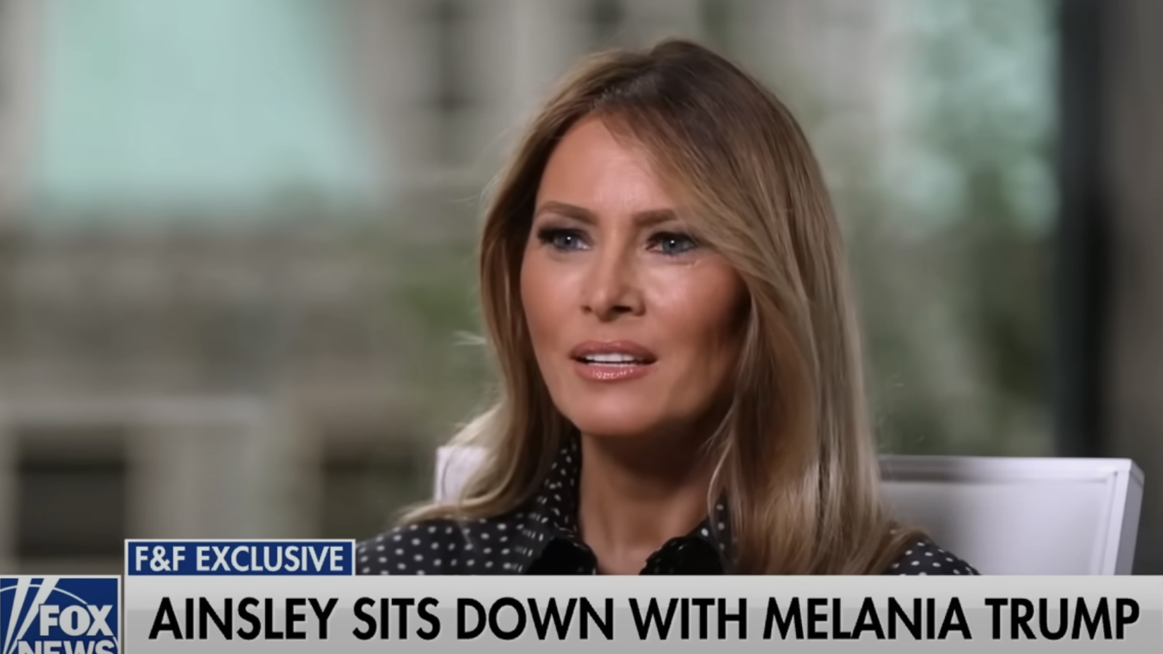 Ainsley Earhardt and Melania Trump in interview setting, with a focus on their conversation. Lower third text reads, "Ainsley sits down with Melania Trump."