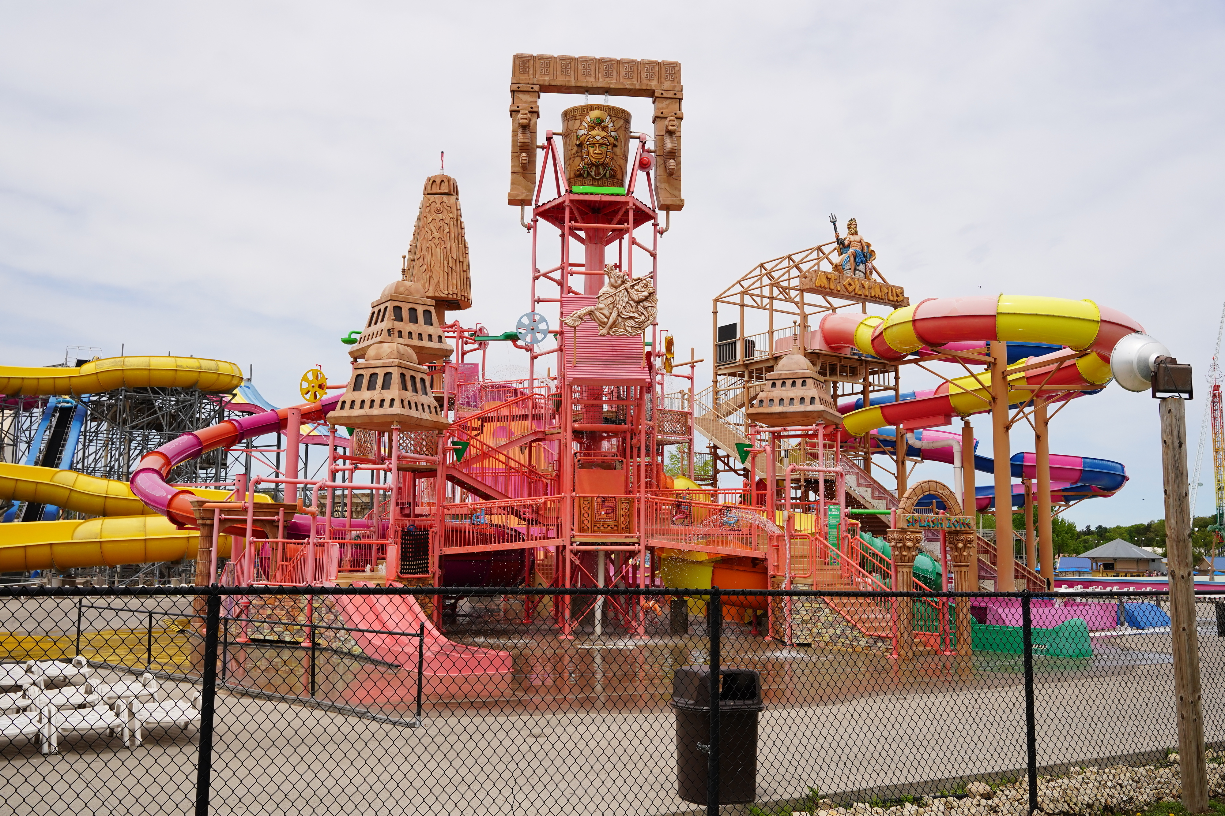 Colorful multi-level water play structure with slides, climbing areas, and water features in the Wisconsin Dells