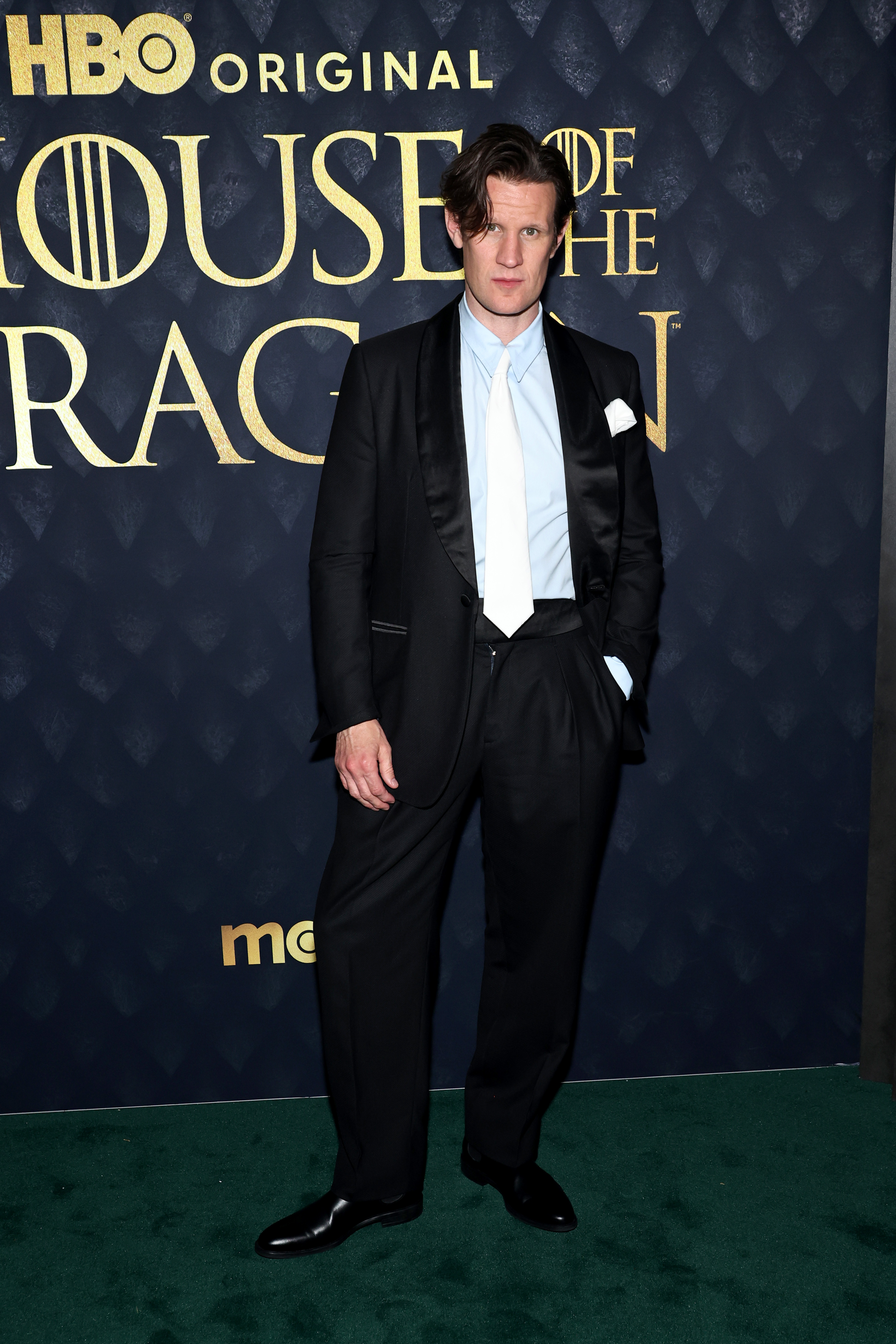 Matt Smith in a dark suit with a white shirt and light tie at the "House of the Dragon" HBO Original event