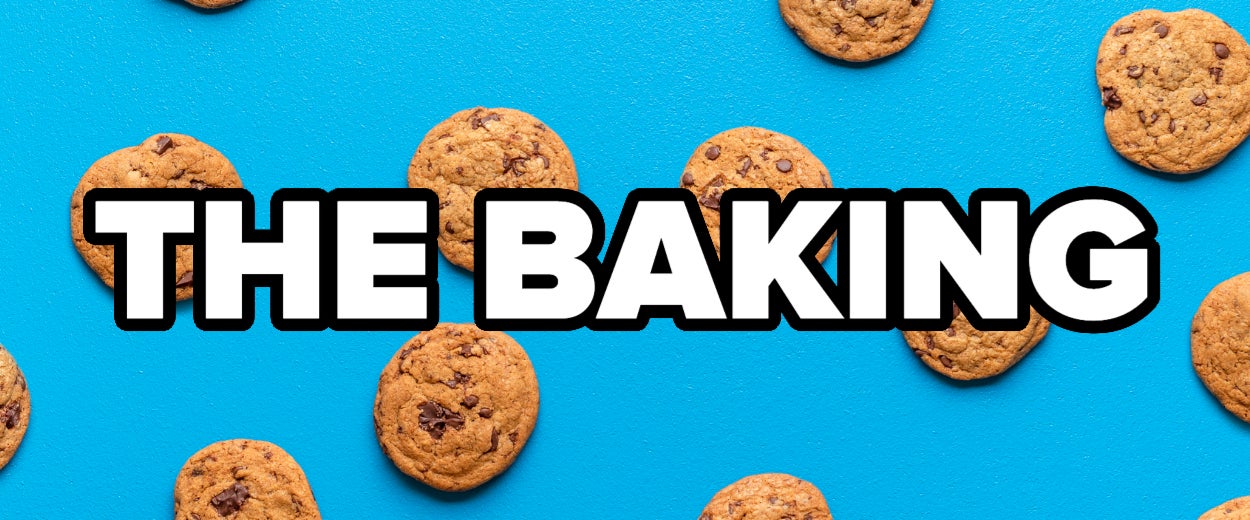 Chocolate chip cookies arranged on a blue background with "THE BAKING" in bold letters in the center