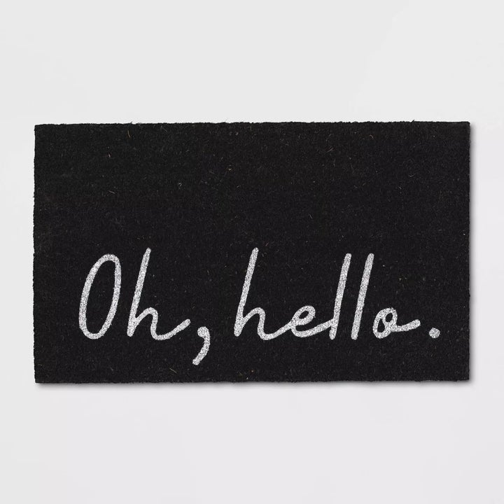 Doormat with the text "Oh, hello." written in a cursive style
