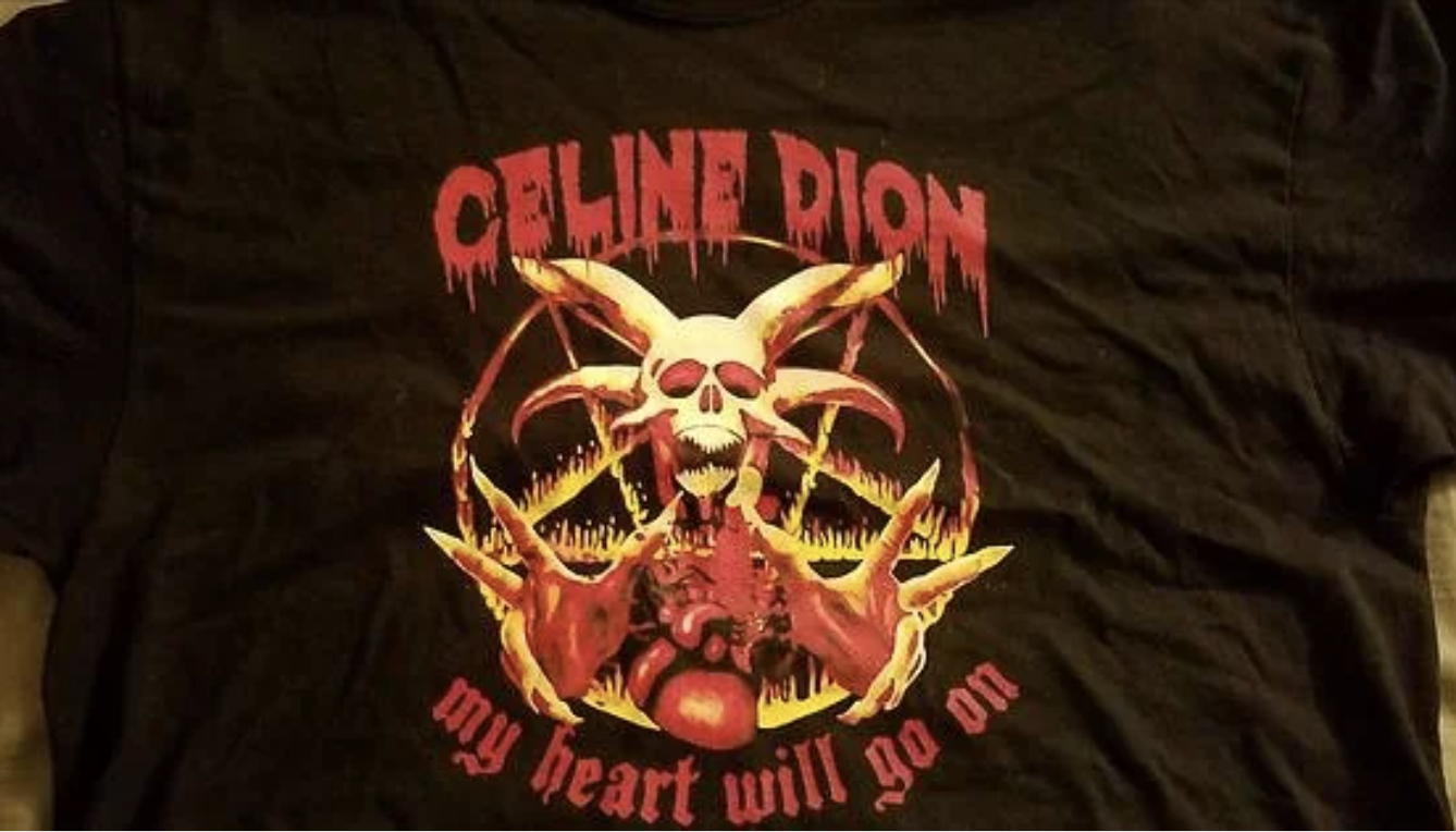 T-shirt depicting a rock-style design with "Celine Dion" at the top, a skull surrounded by flames, and "my heart will go on" at the bottom