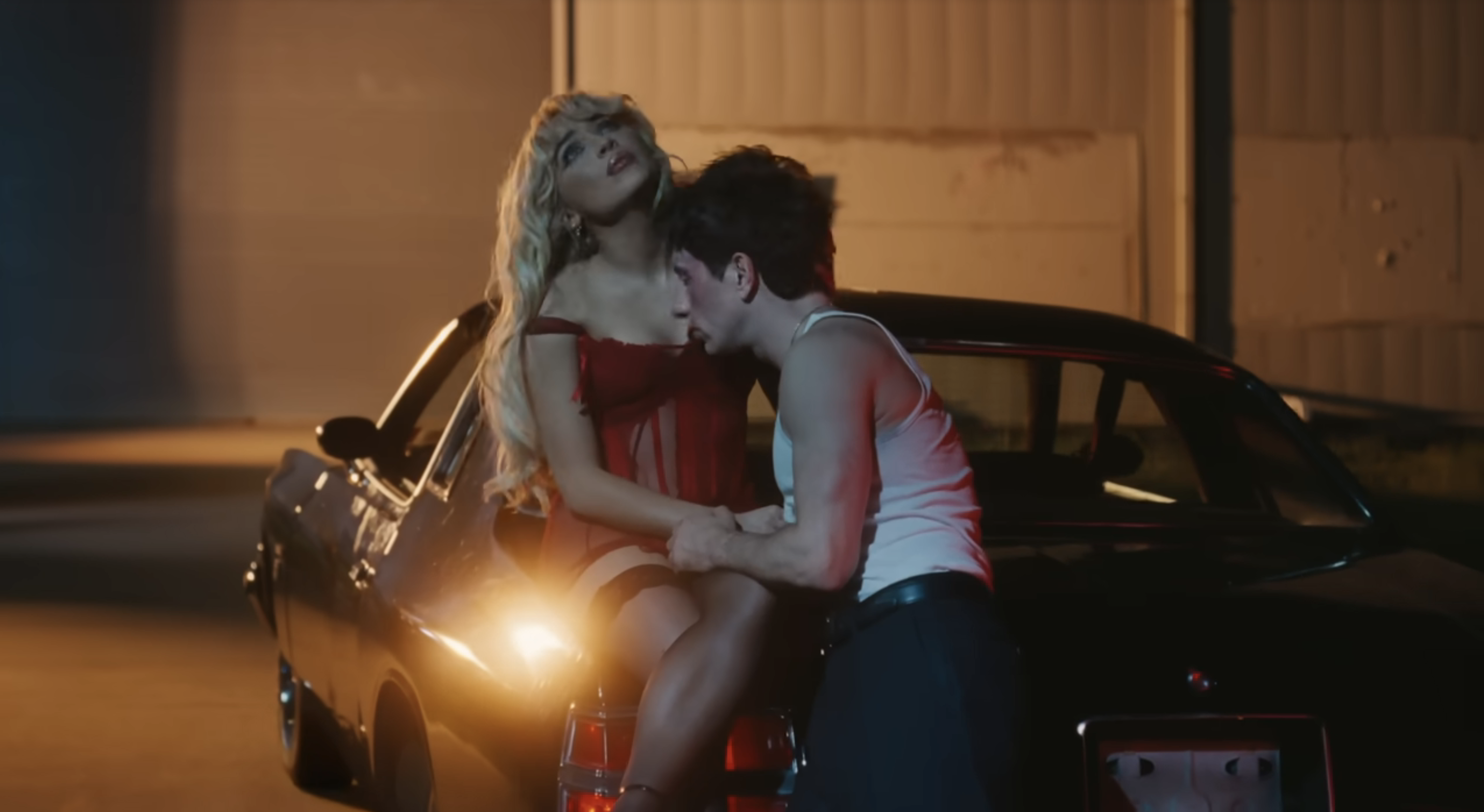 Sabrina Carpenter and Barry Keoghan in the Please Please Please music video