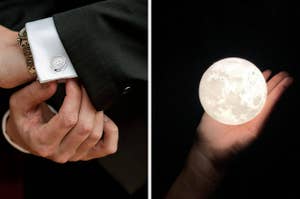 A person adjusts their shirt cuff beside a close-up of a hand holding a round, glowing object resembling the moon
