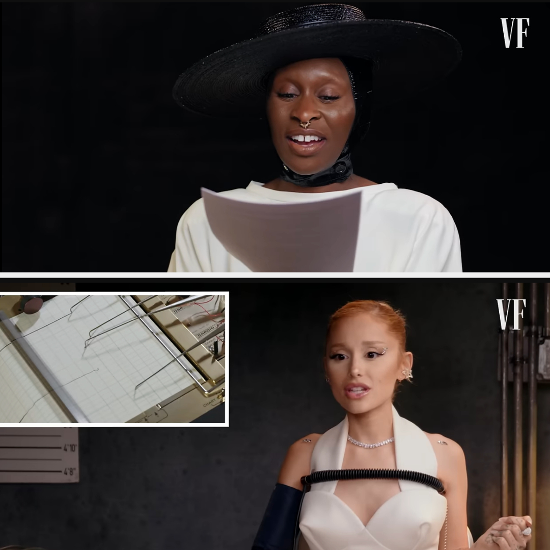 Cynthia Erivo and Ariana Grande participate in a VF segment. Cynthia wears a stylish hat and nose ring, reading from paper. Ariana wears a fashionable gown, speaking animatedly