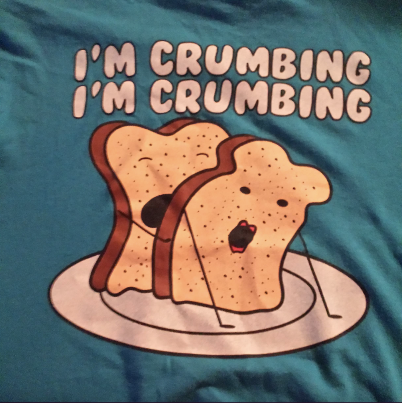 Cartoon image of two slices of bread with faces on a plate, with the text "I'm Crumbing I'm Crumbing I'm Crumbing."