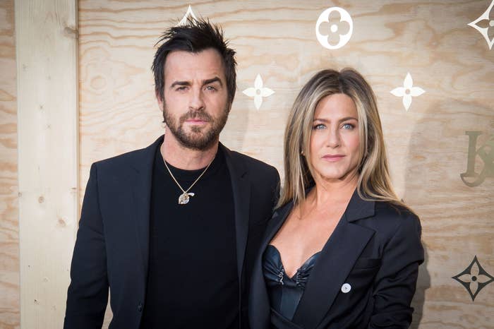 Justin Theroux and Jennifer Aniston standing together