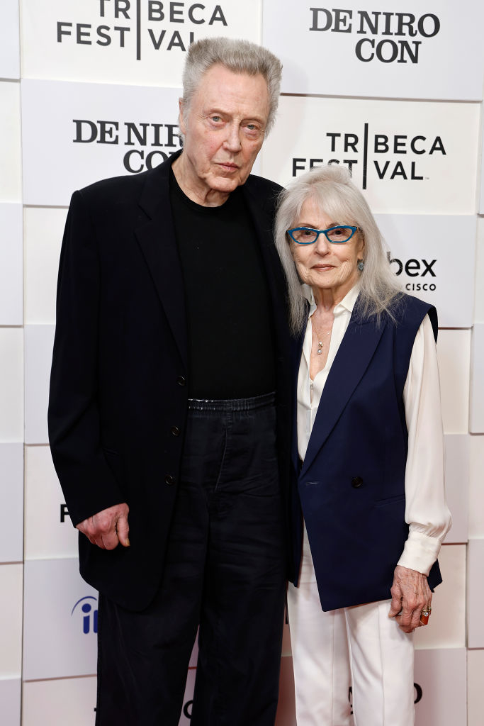 Christopher Walken and Lynn Herring pose together at Tribeca Festival's De Niro Con event. They are dressed in formal attire