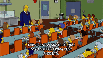 Animated scene from The Simpsons showing students in a classroom with Principal Skinner saying, "Now I know some of you may suffer from test anxiety."