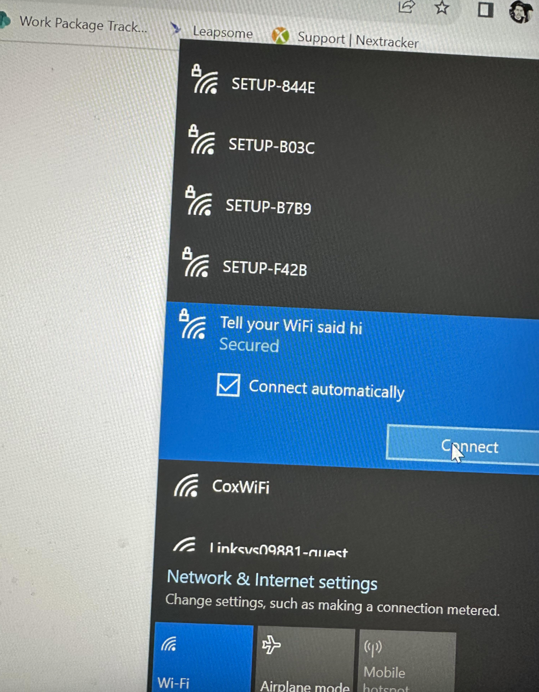 Wi-Fi network selection screen showing multiple networks, with an attempt to connect to a network named "Tell your WiFi said hi."