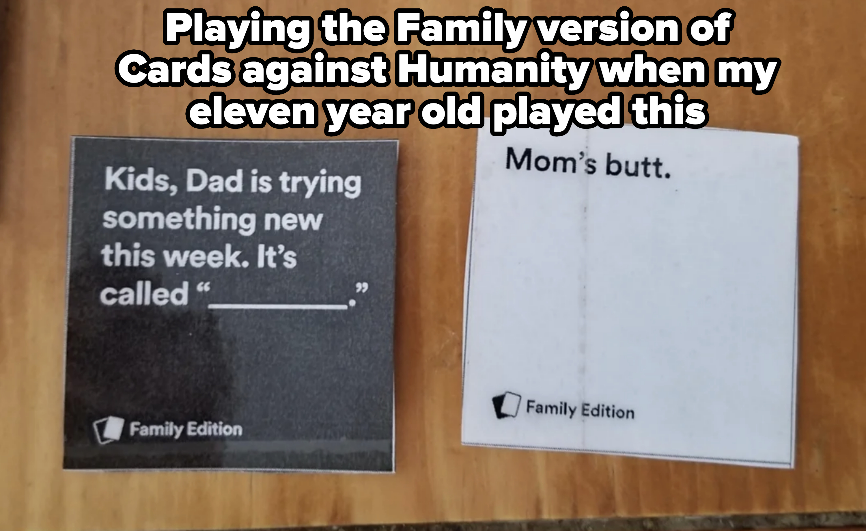 A humorous card from a game reads "Kids, Dad is trying something new this week. It’s called 'Mom's butt.'" Both cards are from "Family Edition."