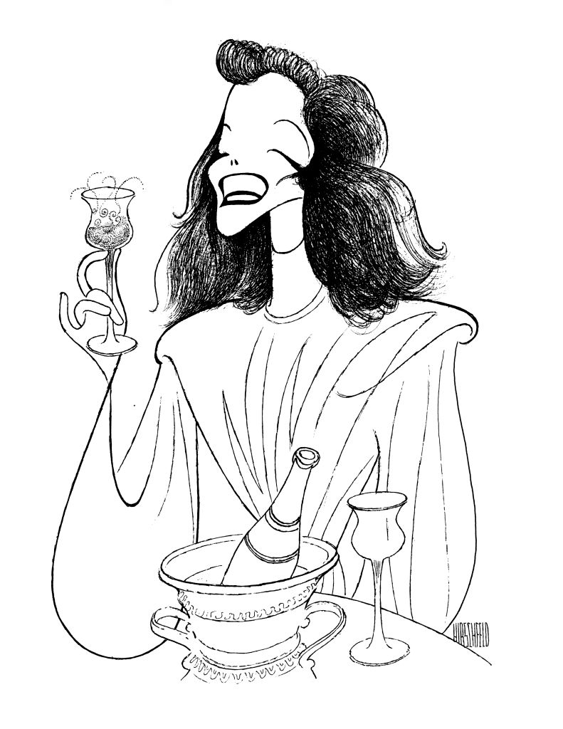 A person with wavy hair is joyfully holding a drink with a raised hand. A bottle in a bucket and an additional glass are on the table. Art by Al Hirschfeld