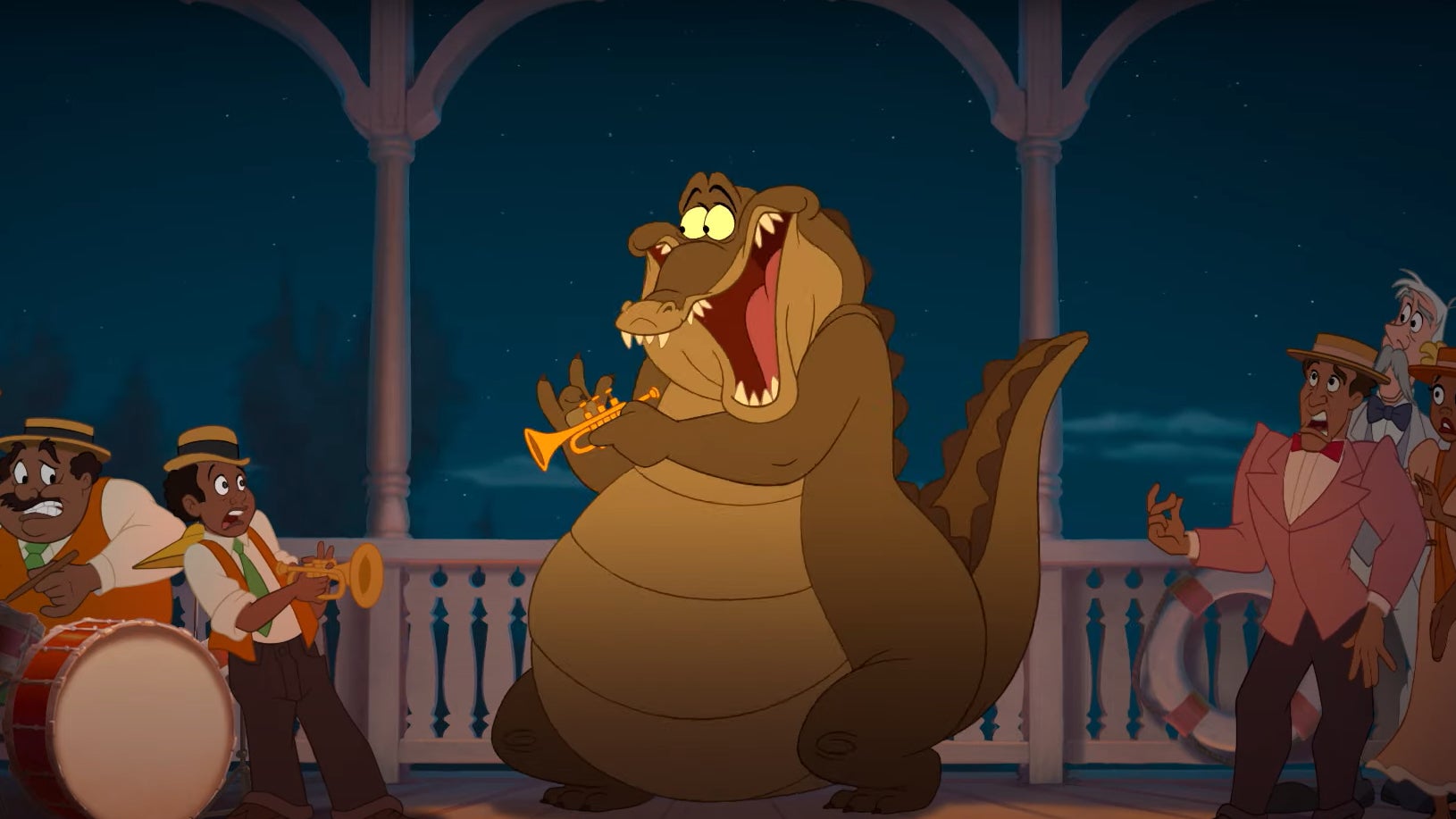 Louis the alligator holding a trumpet surrounded by shocked musicians and guests.