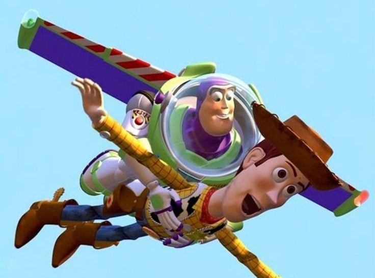 Buzz Lightyear and Woody from Toy Story are flying together with Buzz holding Woody, who is stretched out horizontally